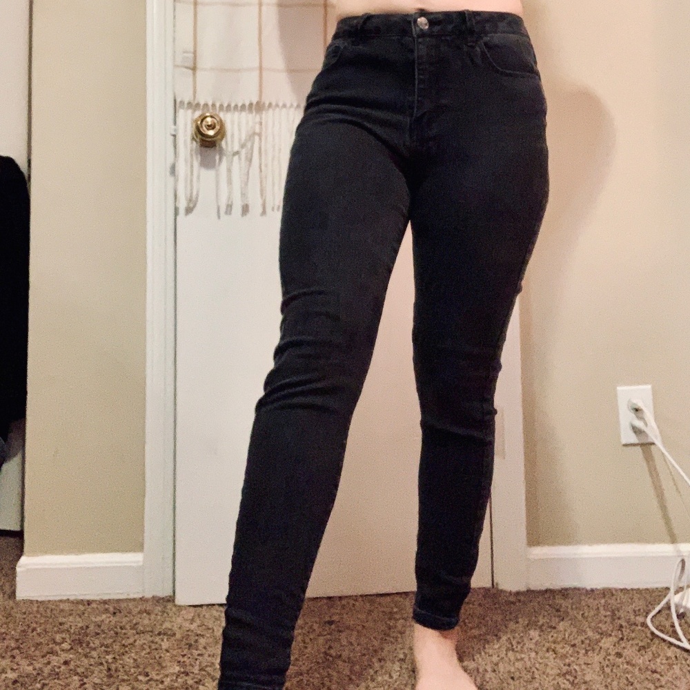 Women's size 28 Forever 21 black faded jeans.